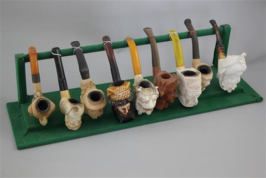 A collection of Meerschaum pipes and cheroot holders,